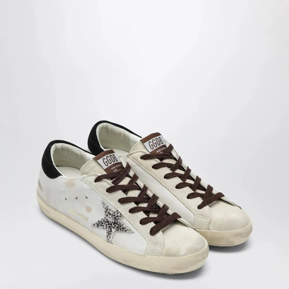 Golden Goose Super-Star sneakers in white with animal-print star