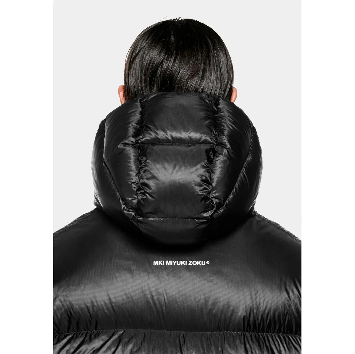MKI TRANSLUCENT HOODED BUBBLE BLACK JACKET