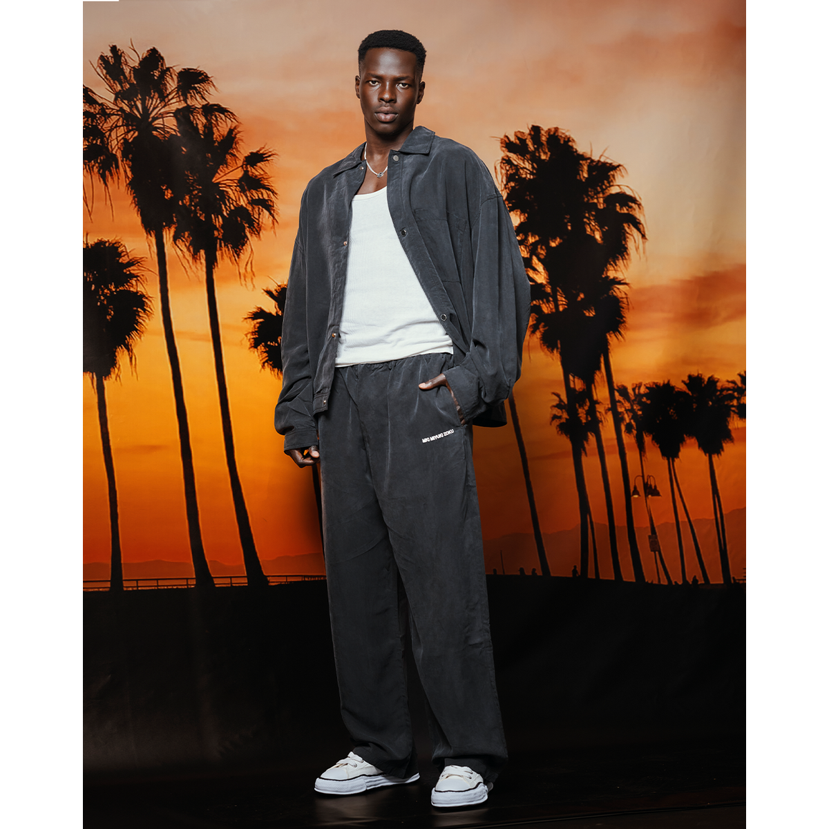 MKI BLACK SANDWASH CUPRO WIDE LEG TROUSERS