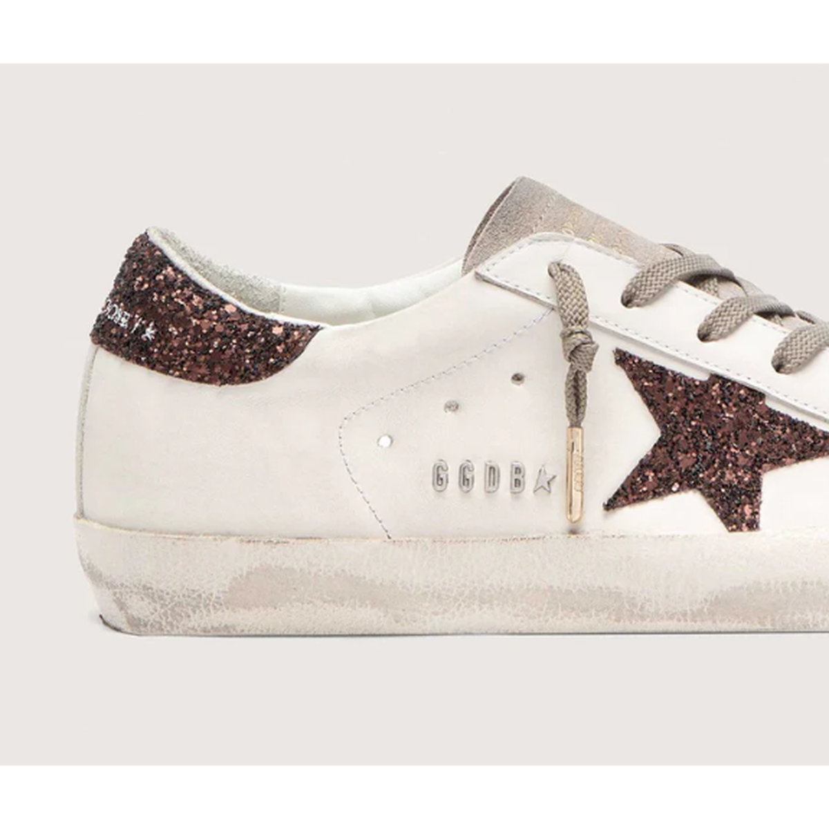 Golden Goose Super-Star Leather Sneakers in Milk, Dove and brown with a Glitter Star and Heel